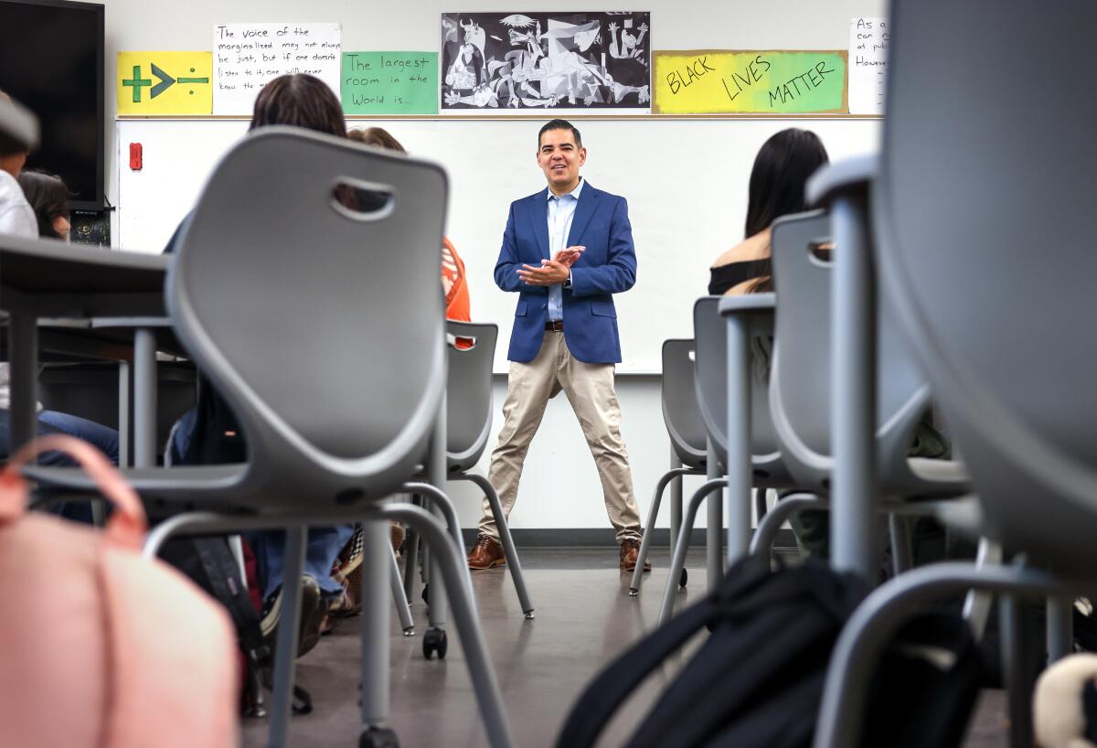 Rep. Robert Garcia speaks to students at McBride High School in Long Beach.