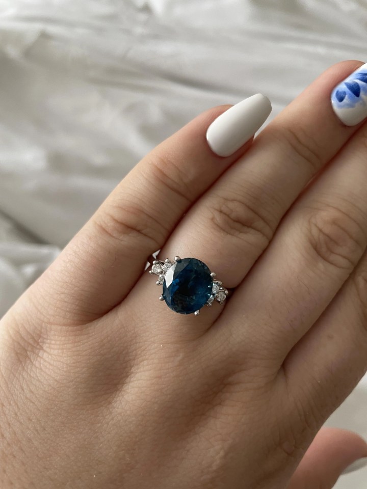 She said the blue topaz ring was repurposed from a stone from her parents' honeymoon