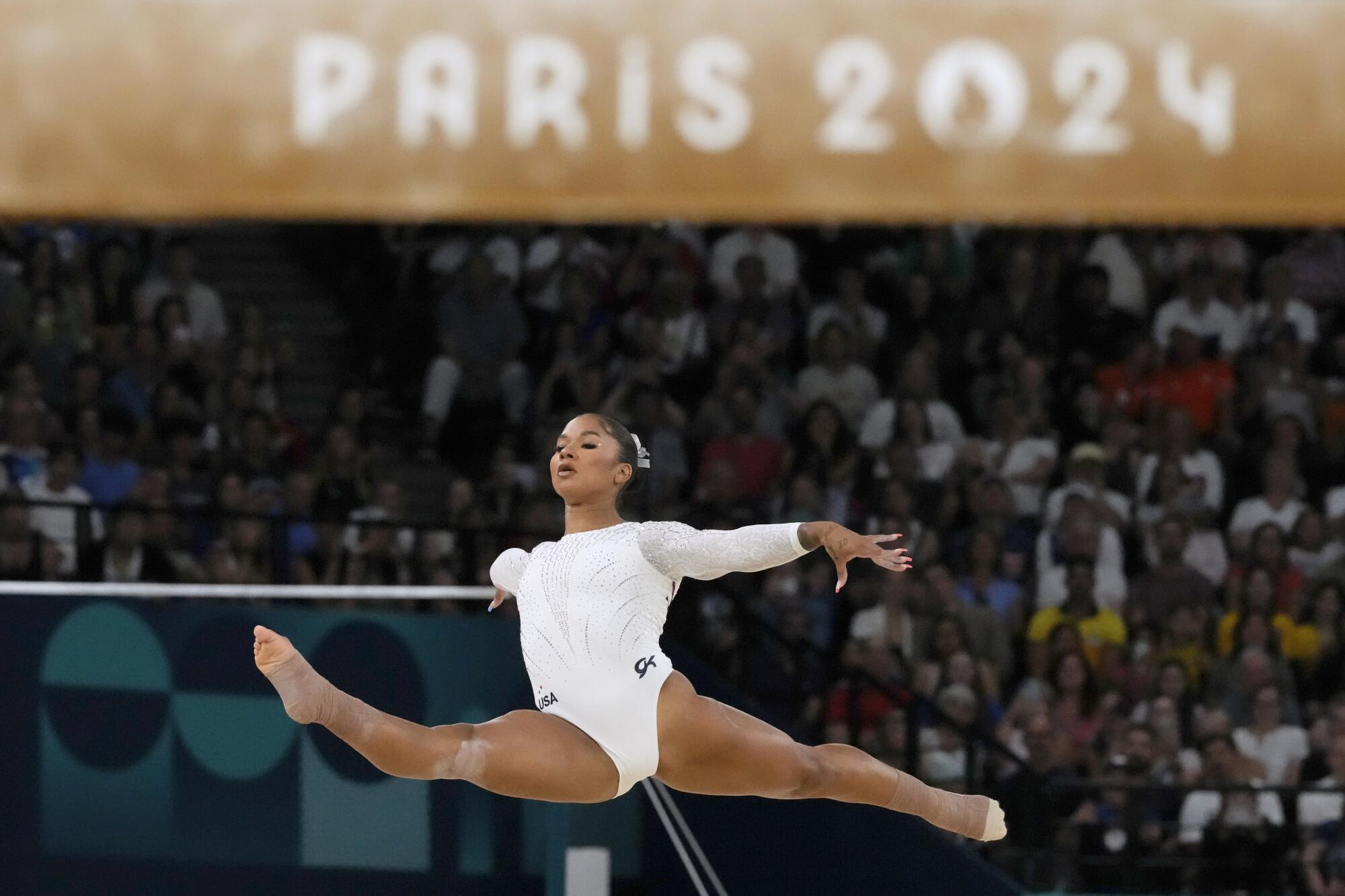 Jordan Chiles leaps during a routine at the Olympics