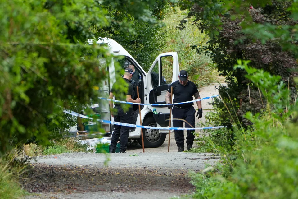 Cops at the scene on the country path in Brantham