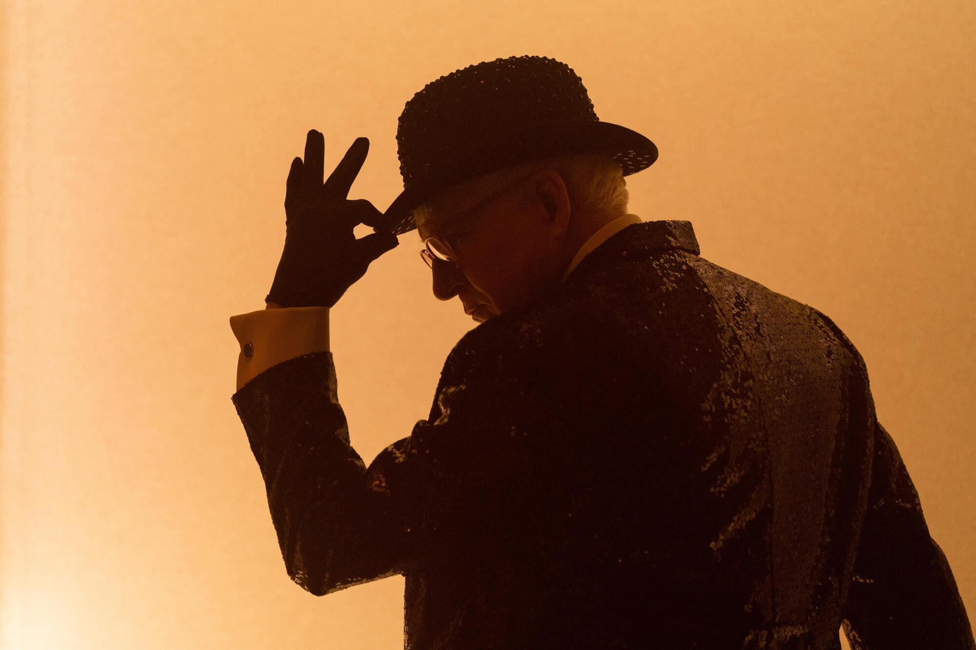 A silhouetted Steve Martin practices his moves in "Only Murders in the Building." 