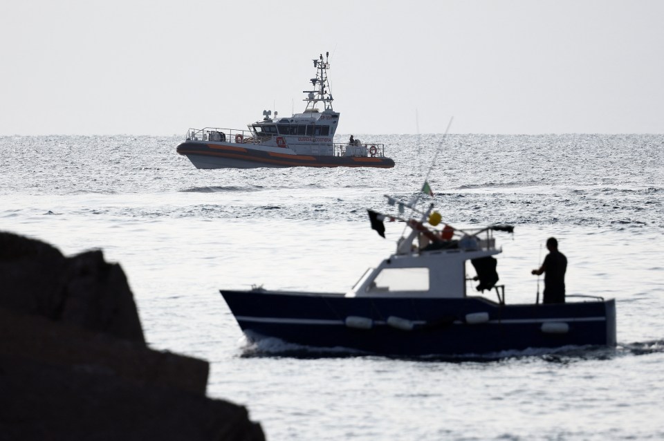 A coast guard vessel operating in the sea to search for the missing