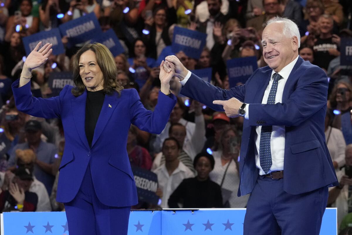 Vice President Kamala Harris and running mate Minnesota Gov. Tim Walz at a rally in Milwaukee.