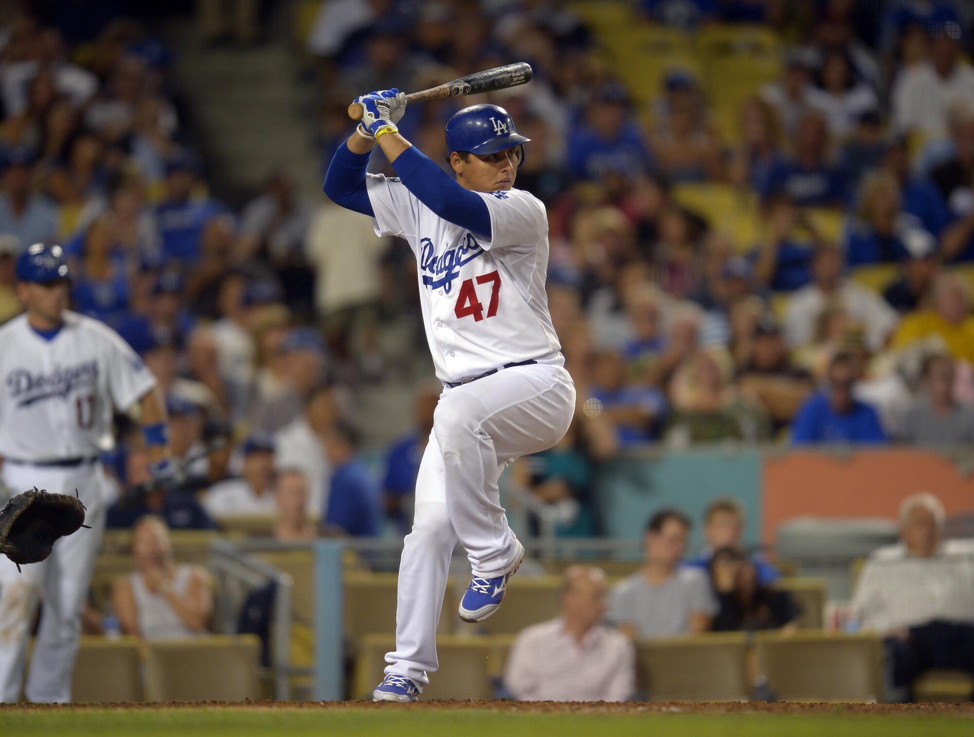 Luis Cruz bats for the Dodgers against the Colorado Rockies in September 2012.