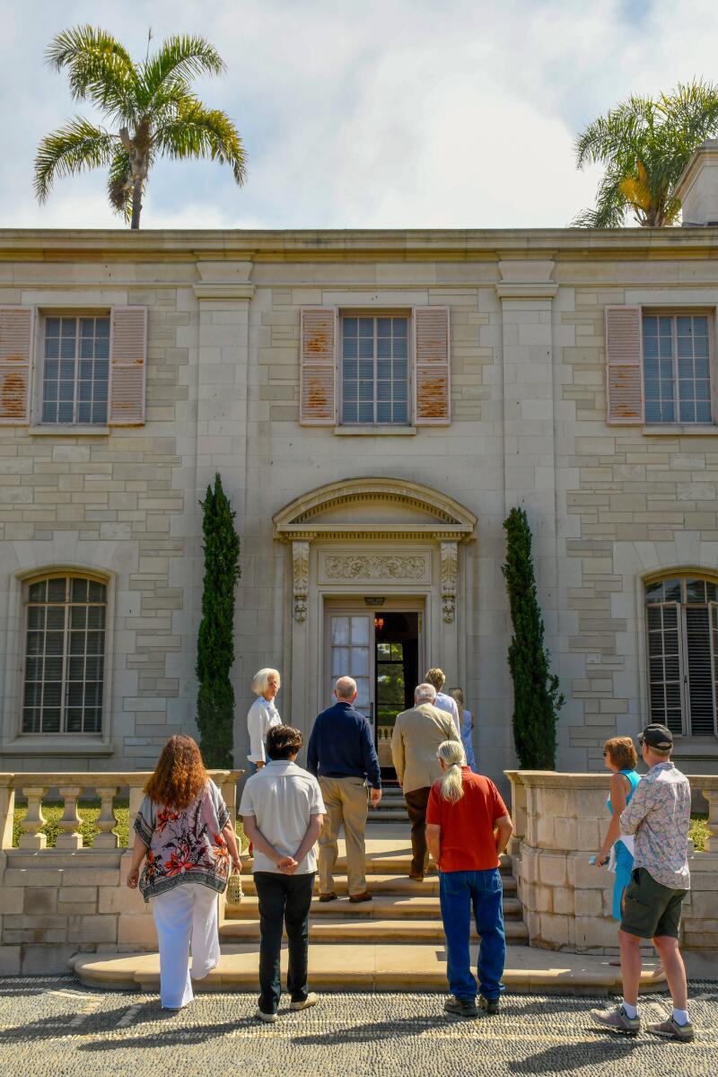 Tour group enters Bellosguardo Estate, Santa Barbara.