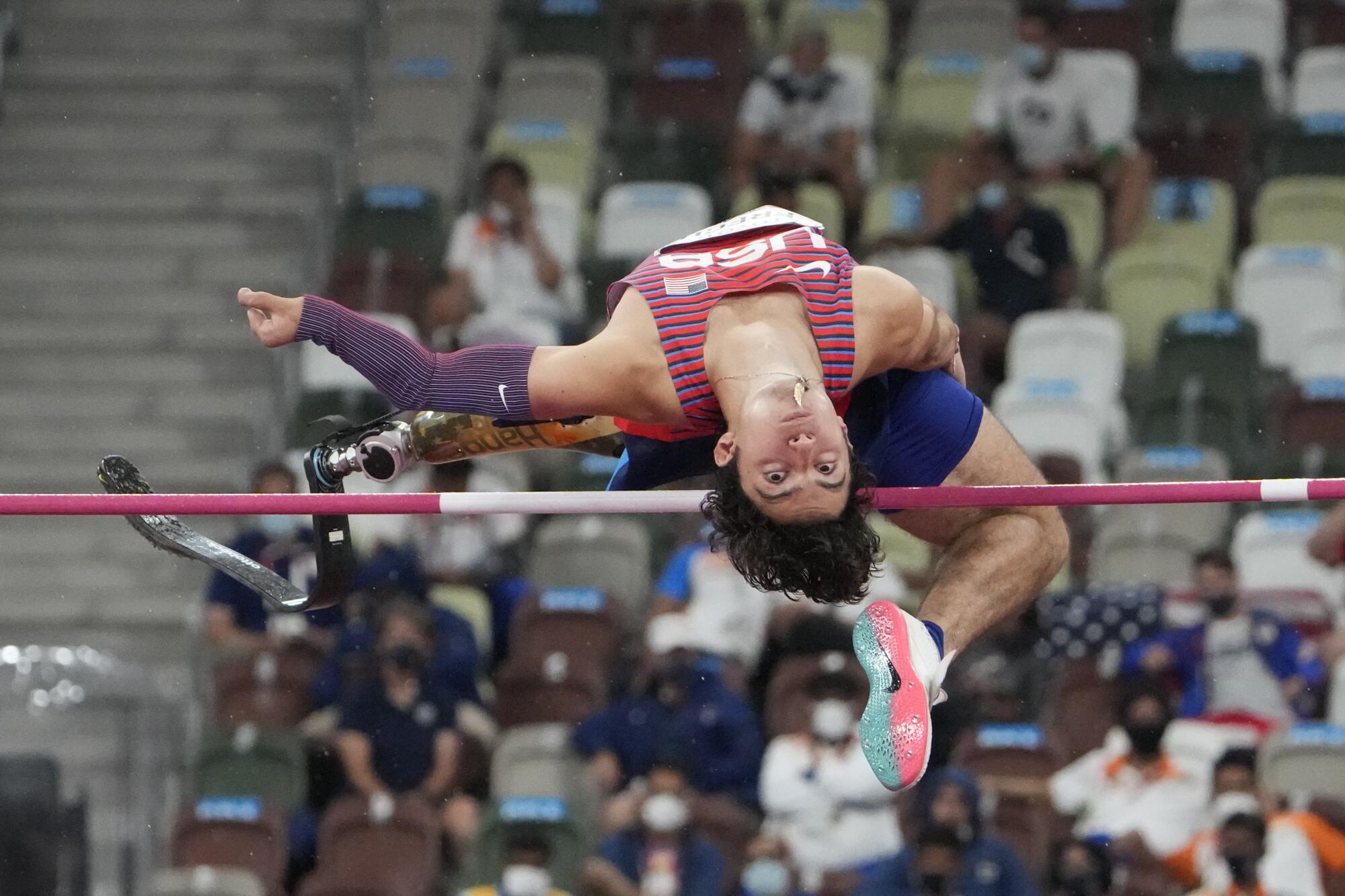 Ezra Frech clears a high bar.