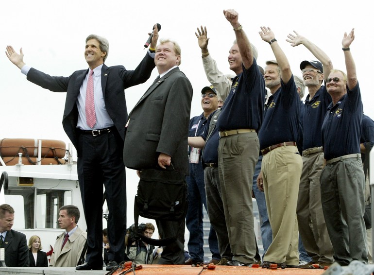 John Kerry campaigns with members of his swift boat team, the veterans who served with him during the Vietnam War.