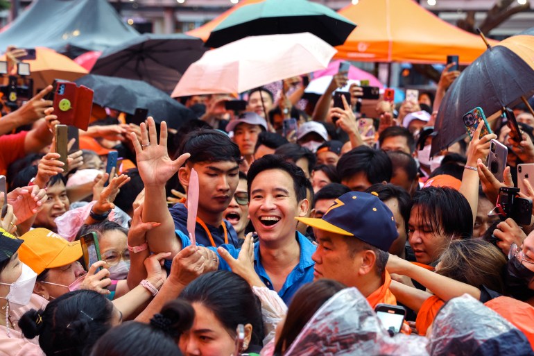 Move Forward Party leader Pita Limjaroenrat greets supporters during a rally to thank voters ahead of the vote for a new prime minister on July 13, in Bangkok, Thailand, July 9, 2023. REUTERS/Athit Perawongmetha