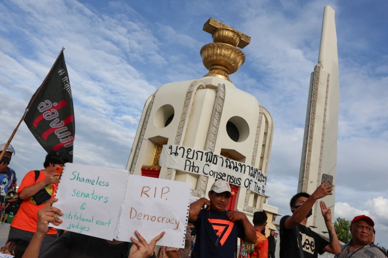 Move Forward Party supporters gather at the Democracy monument after Thailand’s constitution court ordered the temporary suspension of the party's leader Pita Limjaroenrat from the parliament, in Bangkok, Thailand, July 19, 2023. REUTERS/Athit Perawongmetha