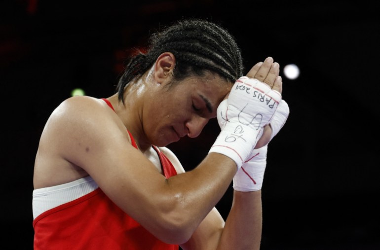 Paris 2024 Olympics - Boxing - Women's 66kg - Quarterfinal - North Paris Arena, Villepinte, France - August 03, 2024. Imane Khelif of Algeria celebrates after winning her fight against Anna Luca Hamori of Hungary. REUTERS/Peter Cziborra