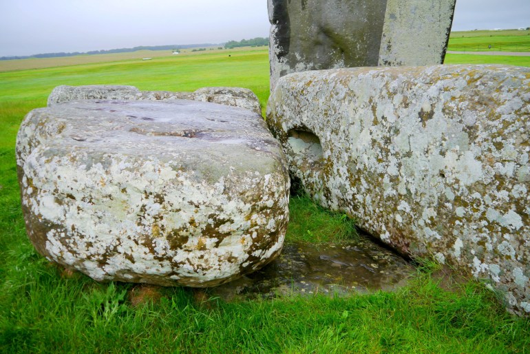 The Altar Stone at the ancient monument Stonehenge located on Salisbury Plain is seen underneath two bigger Sarsen stones in Wiltshire, Britain in this undated photo released on August 14, 2024. Professor Nick Pearce, Aberystwyth University/Handout via REUTERS. THIS IMAGE HAS BEEN SUPPLIED BY A THIRD PARTY. NO RESALES. NO ARCHIVES