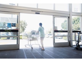 A shopper exits an Aldi supermarket in Alhambra, California, US, on Thursday, June 27, 2024. The Bureau of Economic Analysis is scheduled to release personal consumption figures on June 28. Photographer: Eric Thayer/Bloomberg