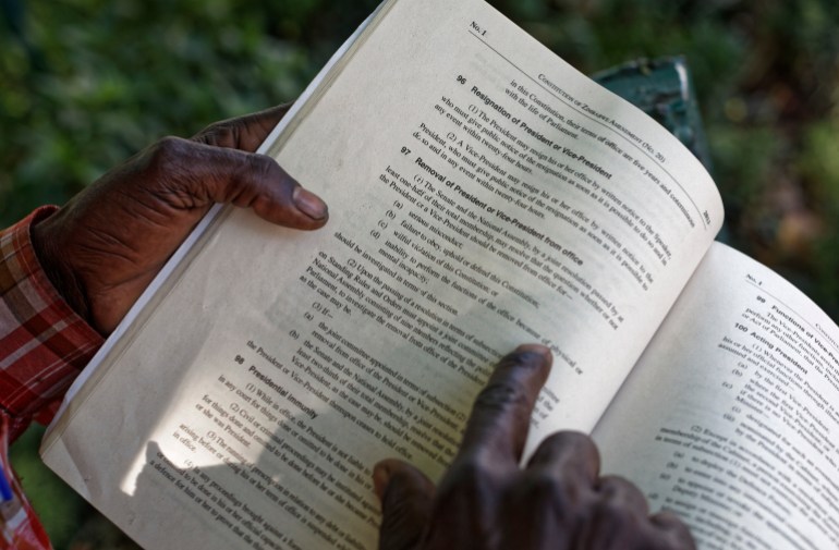 A man reads in Zimbabwe