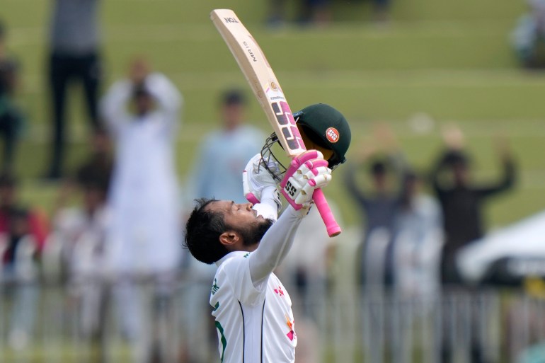 Bangladesh's Mushfiqur Rahim celebrates after scoring century during the fourth day of first cricket test match between Pakistan and Bangladesh, in Rawalpindi, Pakistan, Saturday, Aug. 24, 2024. (AP Photo/Anjum Naveed)