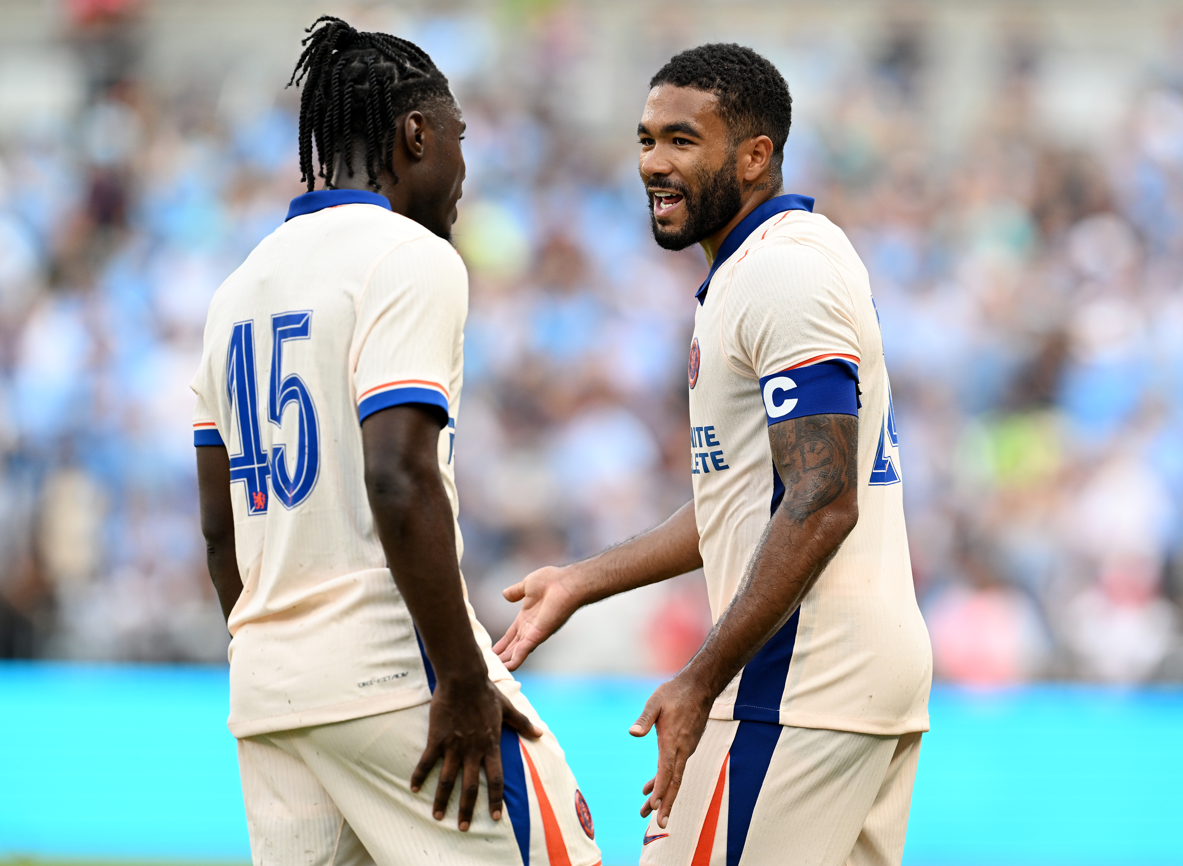 Reece James looks on with Romeo Lavia