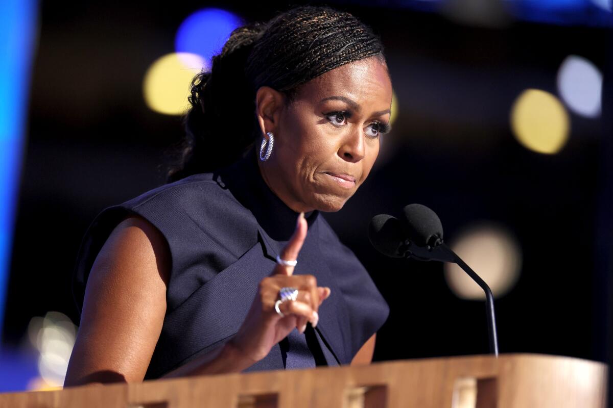 Former First Lady Michelle Obama speaks during the Democratic National Convention in Chicago. 