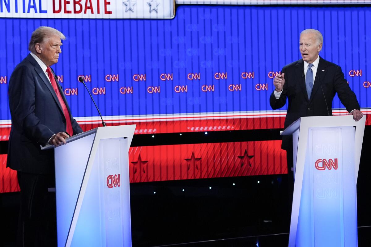 President Biden, right, with Republican presidential candidate  Donald Trump at 2024 CNN debate. 