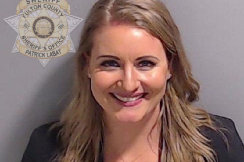 Jenna Ellis, in photo provided by the Fulton County Sheriff's Office on August 23, 2023, in Atlanta, Ga., after being charged for alleged attempts to overturn the results of the state's 2020 presidential election. On Monday, the Arizona attorney general's office announced that the former Trump campaign lawyer would cooperate in its election subversion case, in exchange for her nine felony charges being dropped. File Photo via Fulton County Sheriff's Office/UPI