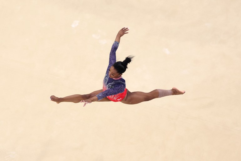 Simone Biles performing floor routine.