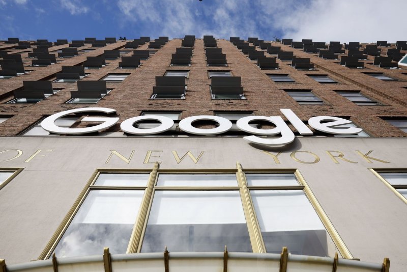 The Google brand logo hangs above the entrance to the Google Building, formerly Union Inland Terminal in New York City on January 20, 2023. Google struck a deal to help fund newsrooms in California on Wednesday. File Photo by John Angelillo/UPI