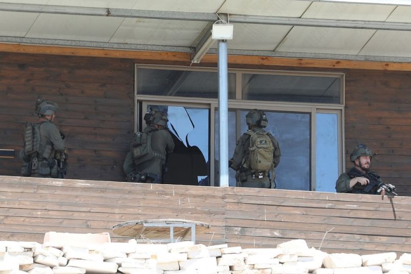 Israeli troops search a building in the West Bank city of Jenin during an Israeli military operation on Aug. 6, 2024. File Photo by Alaa Badarneh/EPA-EFE