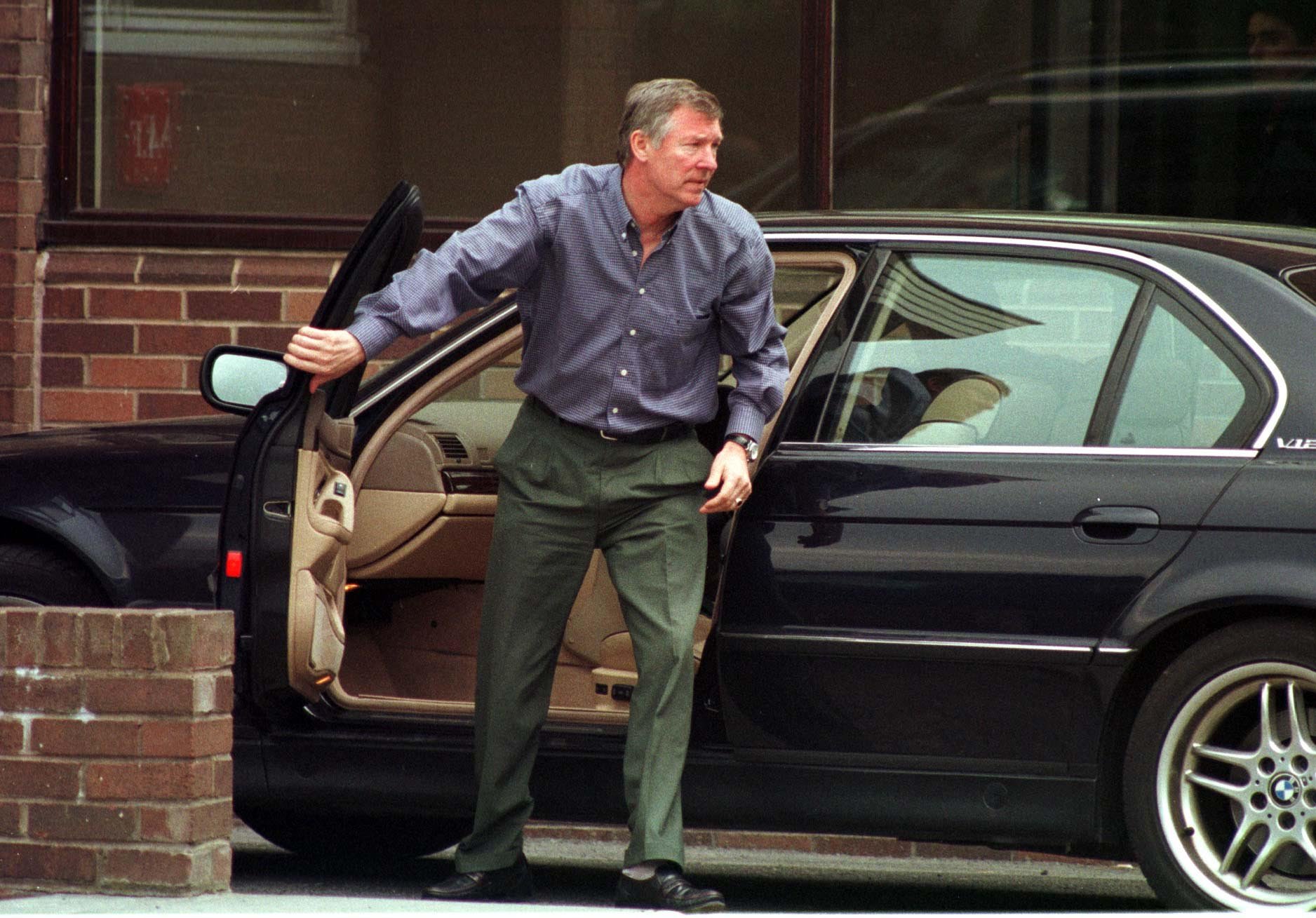 Manchester United's legendary former boss Alex Ferguson arrives at the  Cliff Training Ground  following the arrest of captain Roy Keane