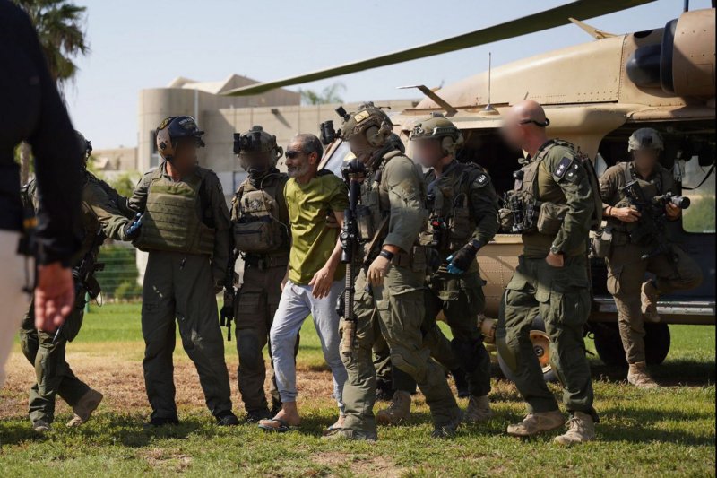 Members of IDF special forces rescue Farhan al-Qadim, a Muslim-Bedouin, on Tuesday. Hamas kidnapped the father of 11 on October 7 and held him captive in a tunnel for 326 days. Photo via Israel Defense Forces/UPI