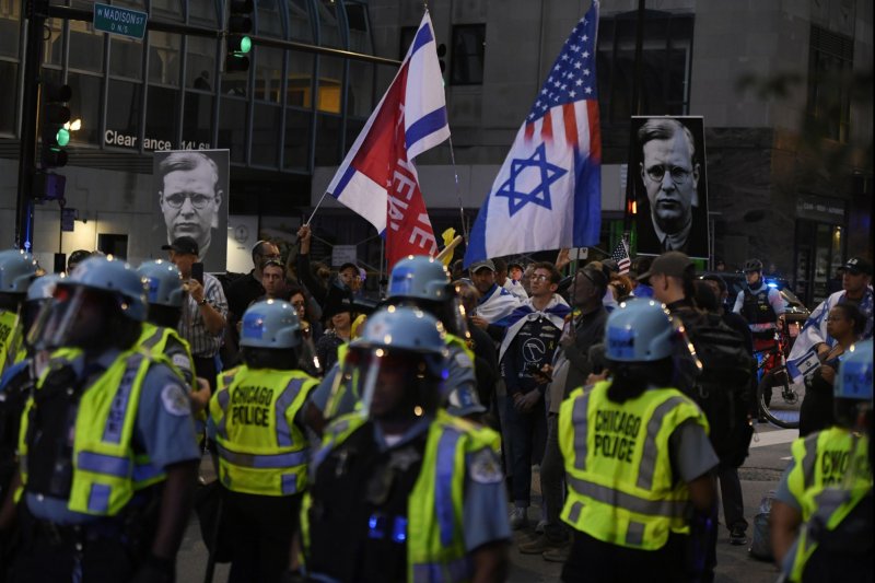 Chicago Police officers on Tuesday protect Israel supporters outside the Consulate General of Israel during the 2024 Democratic National Convention. Photo by Paul Beaty/UPI