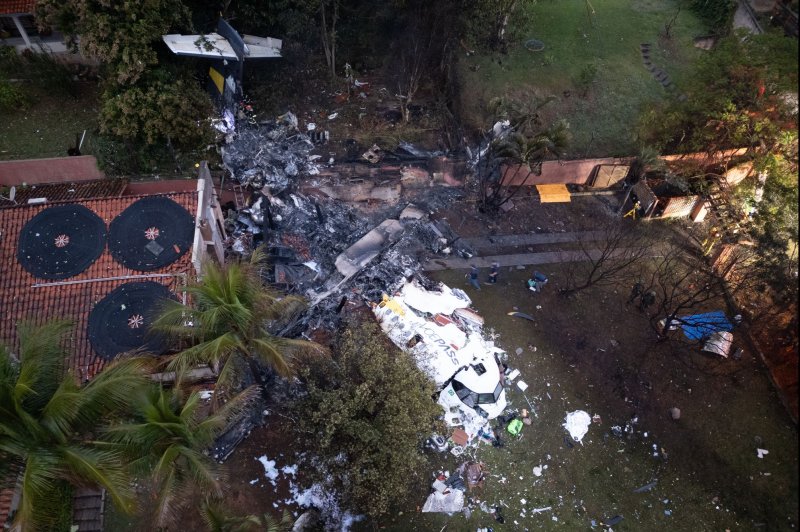 An aerial view shows the site where a Voepass airline plane crashed in Vinhedo, Brazil, on Friday. It went down in a residential area of the Brazilian municipality of Vinhedo, in the state of Sao Paulo, leaving no survivors. Photo by Isaac Fontana/EPA-EFE