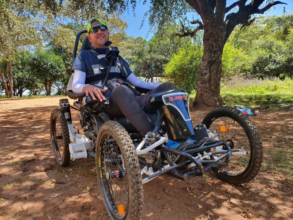 Paralysed Andy Walker has cycled the length of Britain using a bike controlled by his chin