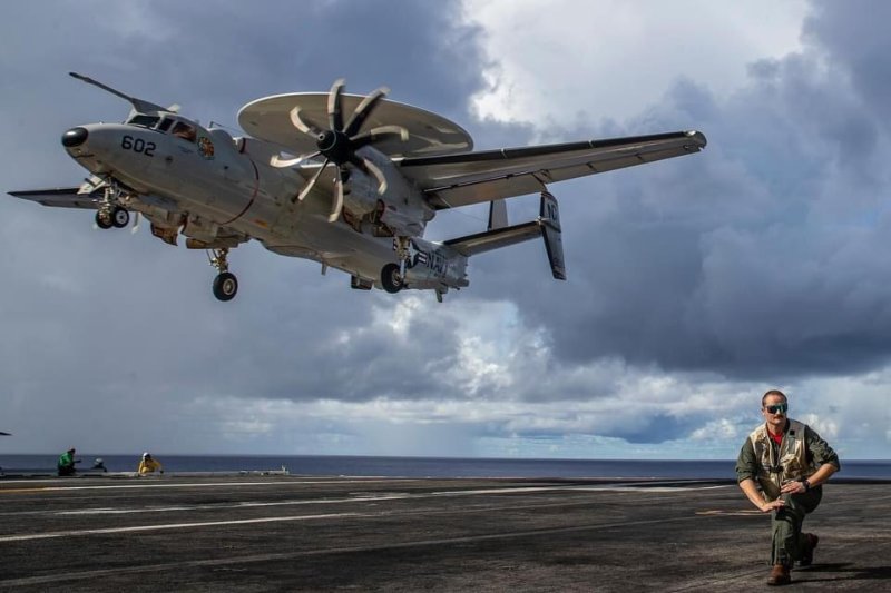 An aircraft is seen flying fee over the tarmac of the USS Abraham Lincoln. The Pentagon said Sunday that the aircraft carrier has been ordered to hasten its transit to the Middle East where tensions soar. Photo courtesy of USS Abraham Lincoln/X