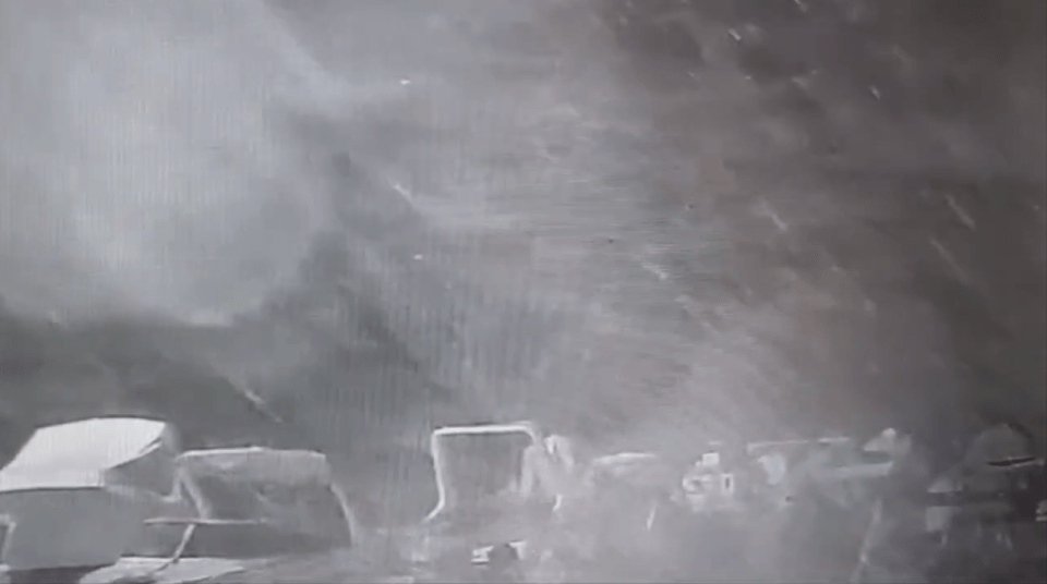 CCTV from the shore shows the moment the vessel was caught in the storm