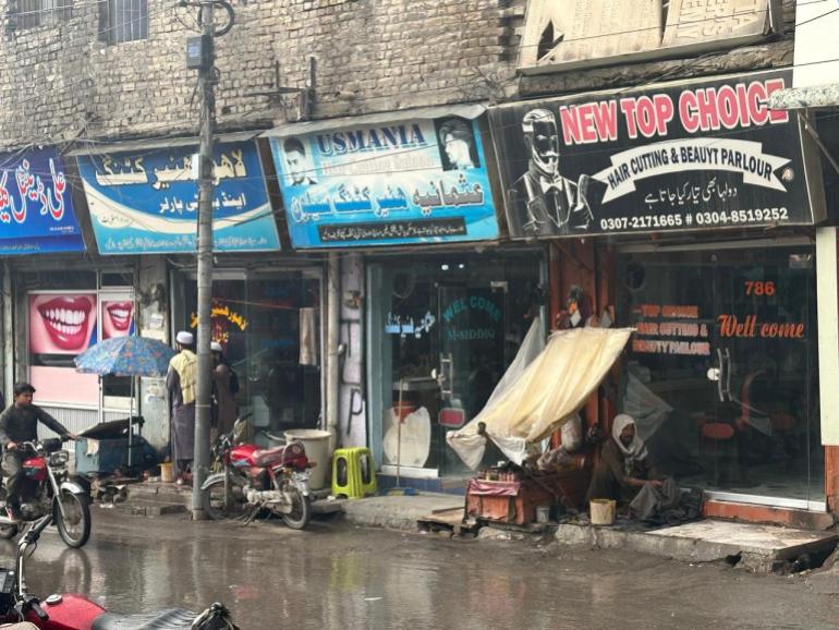 Most of the barber shop in Quetta's Prince Road is owned by migrants from various areas in Punjab. [Courtesy of Saadullah Akhter]