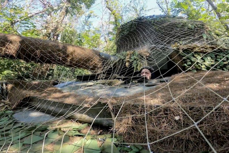 A Russian T-72 battle tank crew take up a position in Kursk region in readiness for combat with invading Ukrainian mechanized units. Moscow insists the effort to defend its Kursk, Belgorod and Bryansk regions from a widening Ukrainian ground incursion is a "counter-terrorism operation." Photo courtesy Russian Defense Ministry Handout/EPA-EFE