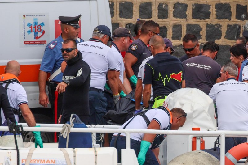 Rescuers in Italy recovered the bodies of four people from the Bayesian yacht on Wednesday, with two passengers still missing. Photo by Igor Petyx/EPA-EF