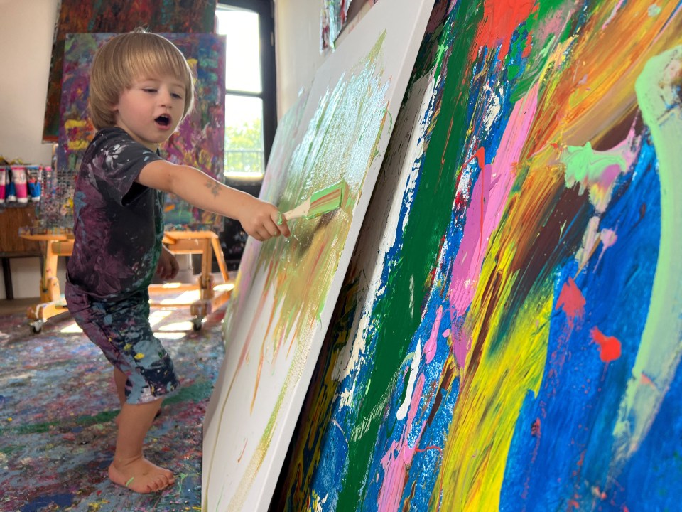 Laurent Schwarz, two, has been dubbed the 'pint-sized Picasso'