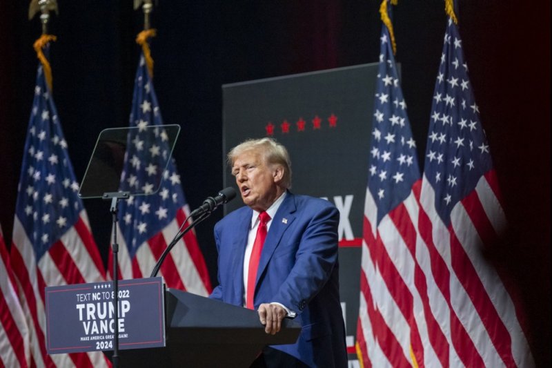 Republican presidential candidate Donald Trump speaks at a campaign rally at Harrah’s Cherokee Center in Asheville, N.C., on Wednesday. During a Thursday press conference in New Jersey, Trump again hurled personal insults a Democratic nominee Kamala Harris. Photp by Sean Meyers/EPA-EFE