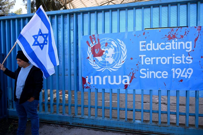 Israeli activists take part in a protest blocking the entrance to the UNRWA, United Nations Relief and Works Agency for Palestine Refugees, headquarters in Jerusalem on March 20. Protesters called for the removal of UNRWA from Jerusalem after several of their workers took part in the Hamas massacre and kidnapping of Israelis on Oct. 7 along the Gaza border. File Photo by Debbie Hill/UPI