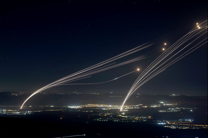 As Israel increases tensions in the Middle East, projectiles fired from the Israeli Iron Dome air defense system intercept missiles fired from southern Lebanon. Photo by Atef Safadi/EPA-EFE