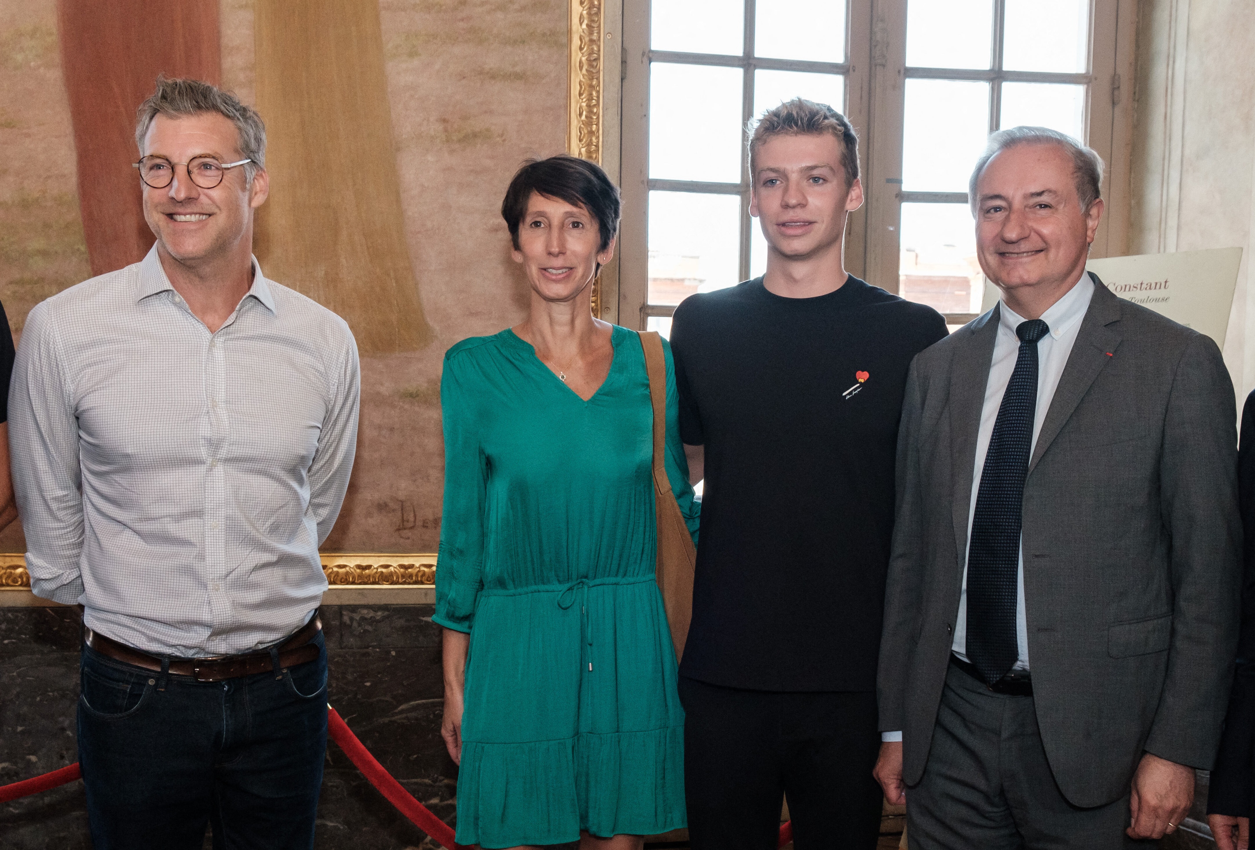 Leon (centre right) pictured with dad Xavier (left), mum Celine (centre left) and Mayor of Toulouse Jean-Luc Moudenc (right) in 2023