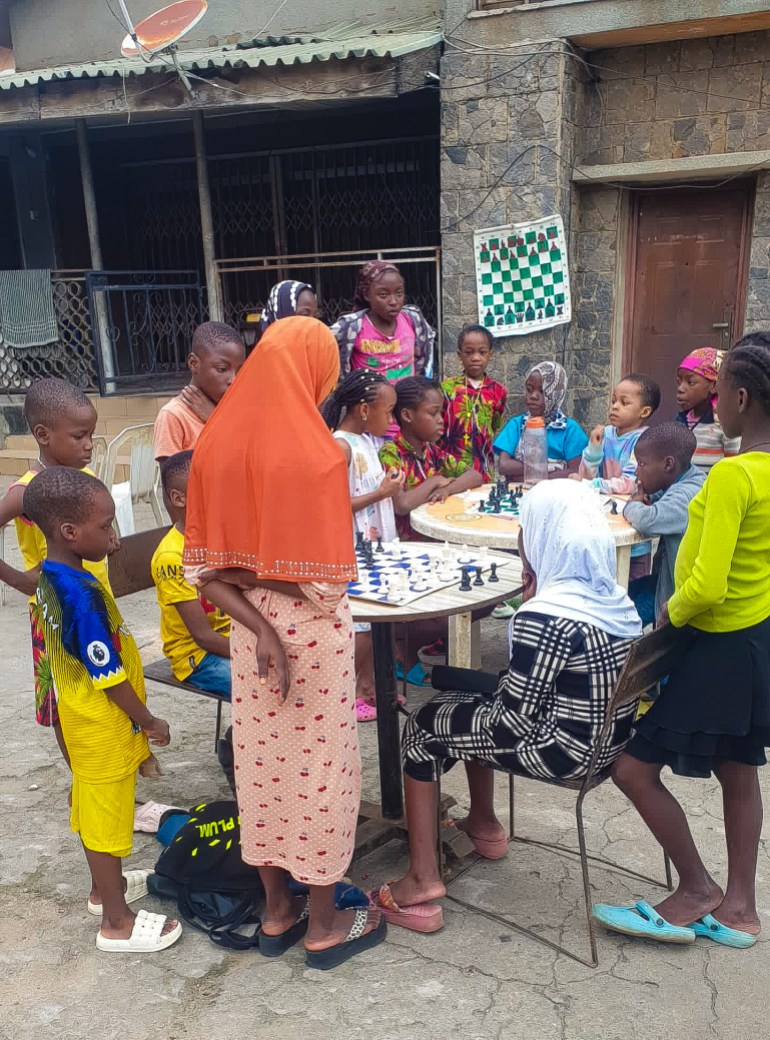 Children play chess in Nigeria