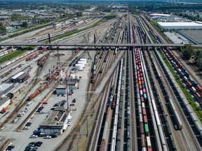 Trains are seen in an aerial view of the Canadian Pacific Kansas City (CPKC) rail yard in Port Coquitlam, B.C., on Monday, Aug. 19, 2024. An impending labour stoppage on Canada's two national railways has riled industry groups who worry consumers and businesses will be hit hard if goods ranging from grains to french fries to petrochemicals can't be moved.