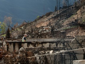 The road to recovery is starting to clear for businesses in Jasper Alta., a month after more than 20,000 visitors to Jasper National Park and 5,000 town residents were forced to flee a raging wildfire. Workers continues to assess, repair and rebuild as some residents return to Jasper, Alta., Monday, Aug. 19, 2024.