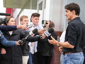 Prime Minister Justin Trudeau, speaks to the media regarding the rail lockouts following a tour of Verbom, a sheet metal processing company for the automotive and recreational vehicle industry in Sherbrooke, Que. on Aug. 22, 2024.