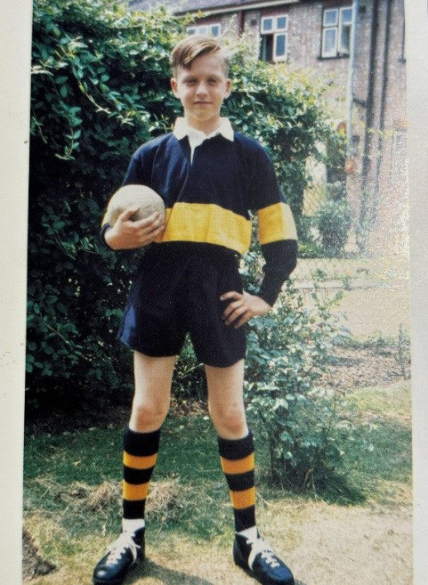 A young Richard Madeley posing in his football kit