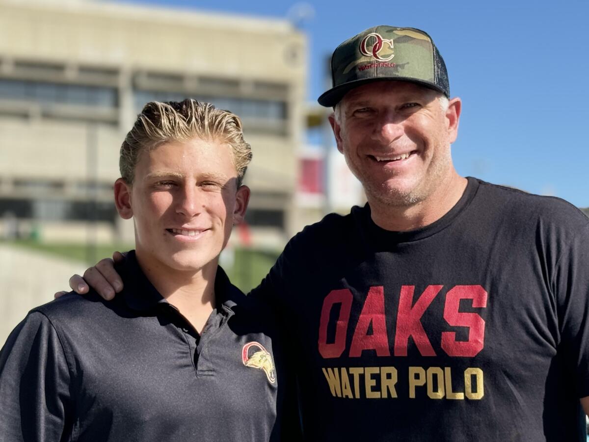 Oaks Christian water poloo coach Jack Kocur with his son, Cam, a standout player for the team.