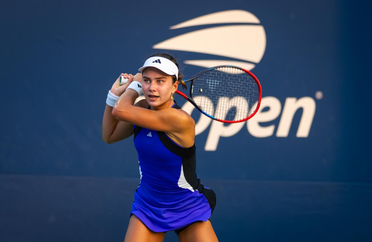 Torrance teen Iva Jovic prepares to strike the ball during a U.S. Open match against Poland's Magda Linette.