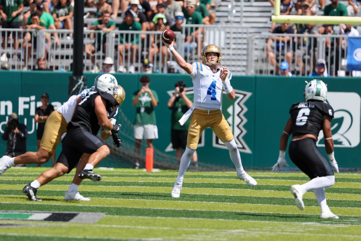 UCLA quarterback Ethan Garbers passes against Hawaii in the first half Saturday.