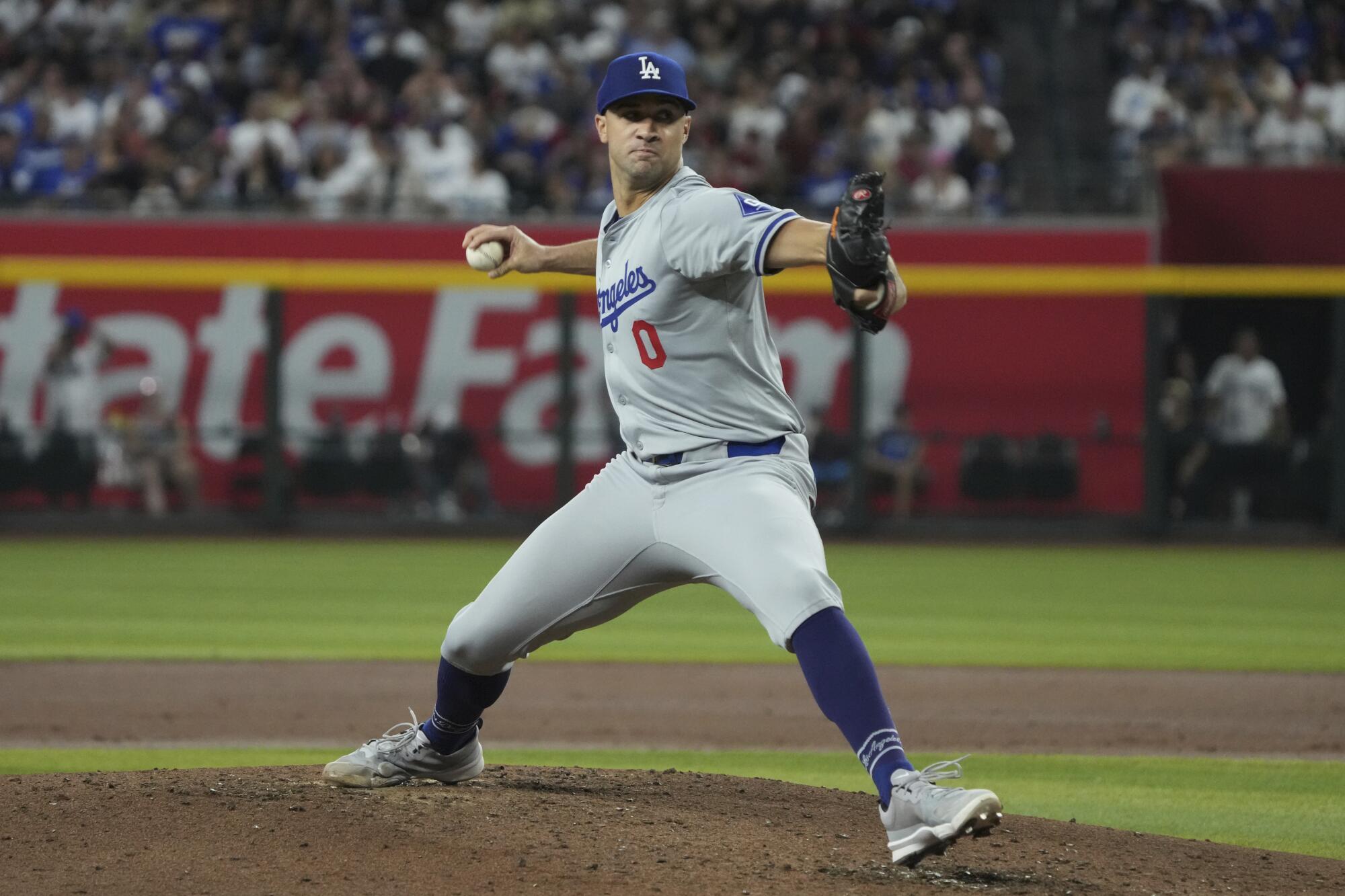 Dodgers pitcher Jack Flaherty delivers against the Arizona Diamondbacks in the third inning Monday.