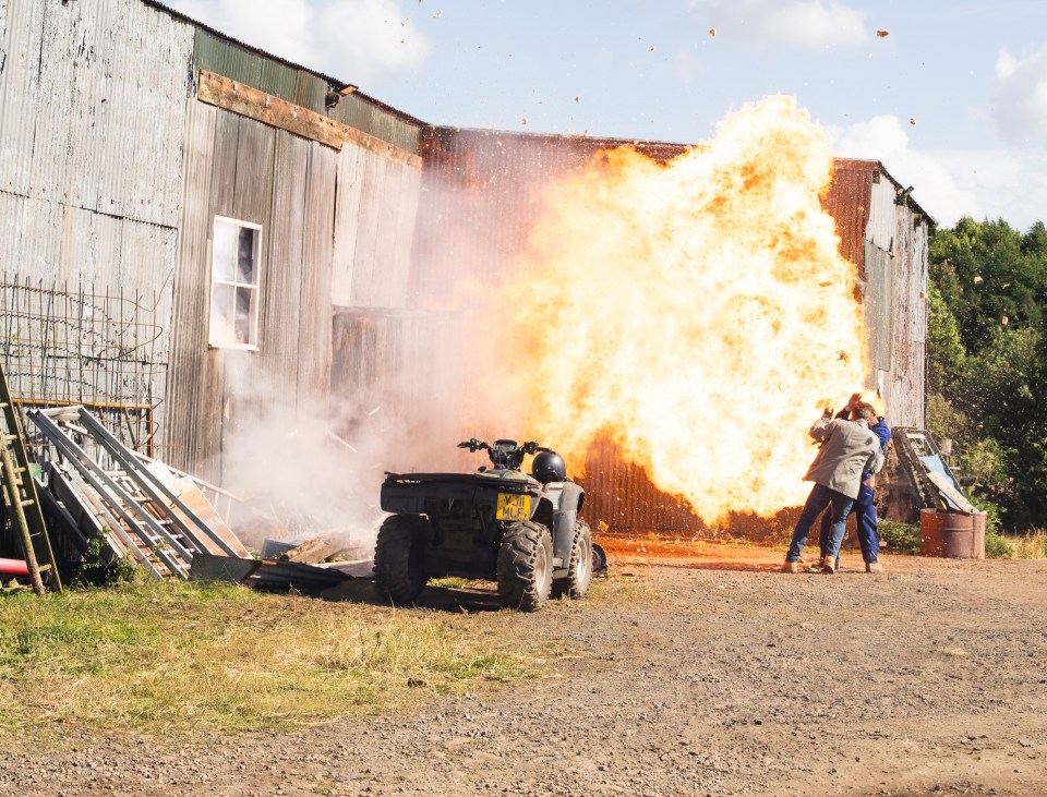 A huge explosion throws everyone to the ground